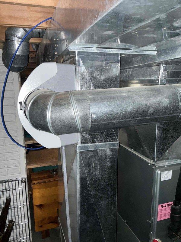 Responded to emergency AC service call and conducted comprehensive system evaluation for replacement estimate. Documented existing HVAC equipment including attic-mounted air handling unit with R-410A refrigerant system and basement furnace installation with associated ductwork configurations. Assessed current system condition, photographed equipment placement and mechanical room layout to provide accurate replacement specifications for both heating and cooling components.