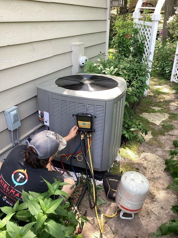 Completed full HVAC system installation including new Lennox furnace in basement utility area with proper PVC venting configuration and outdoor air conditioning unit. Performed system startup, refrigerant charging, and operational testing to verify proper performance of both heating and cooling components.