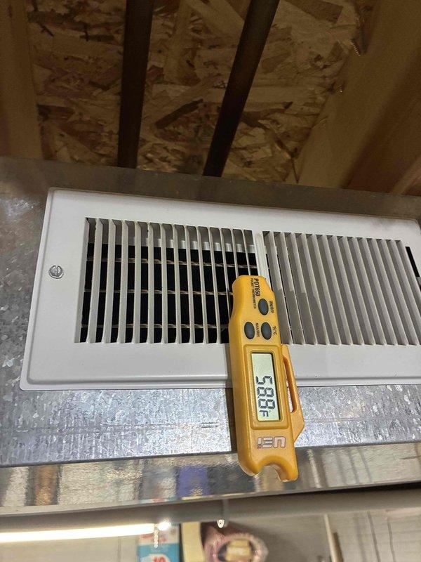 Responded to no cooling call with unit running continuously and indoor temperature at 76-78°F. Performed diagnostic testing using digital multimeter on HVAC system components and measured supply air temperature at 58°F at the register, indicating insufficient cooling capacity. Inspected electrical connections, capacitor, and compressor wiring during troubleshooting process to identify cause of inadequate system performance.