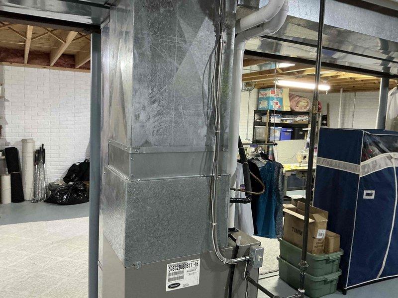 Responded to emergency service call for newly installed AC system experiencing issues. Evaluated electrical panel and ductwork installation in basement area. Refunded and replaced defective capacitor on new HVAC equipment to restore proper system operation.