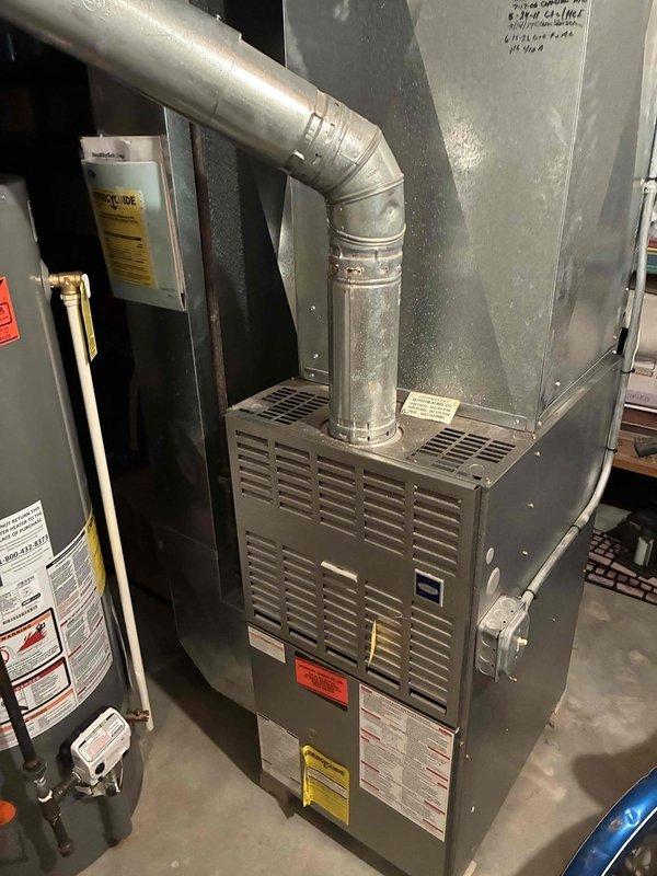 Responded to no cooling complaint on residential HVAC system over 10 years old. Upon inspection, identified refrigerant leak at brass flare fitting connection, evidenced by visible corrosion and wear on component. Replaced defective fitting, pressure tested system, recharged refrigerant to manufacturer specifications, and verified proper cooling operation before departure.