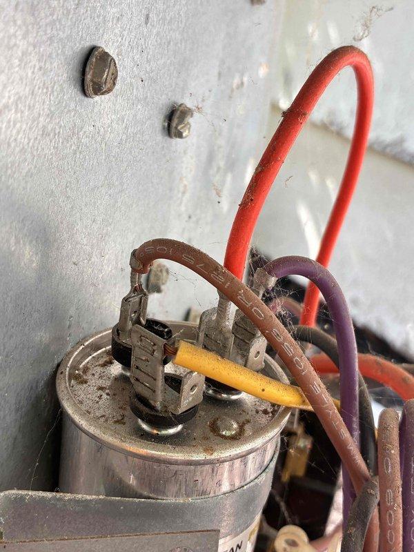 Responded to no cooling call where system had completely shut down. Upon arrival, verified electrical supply at breaker panel was intact. Performed diagnostic testing on outdoor unit and identified failed run capacitor. Tested capacitor with digital multimeter, confirming capacitance reading well below manufacturer specifications at 0.133 MFD. Replaced defective dual run capacitor, verified all electrical connections at compressor and condenser fan motor terminals, and restored system to normal operation with proper cooling.