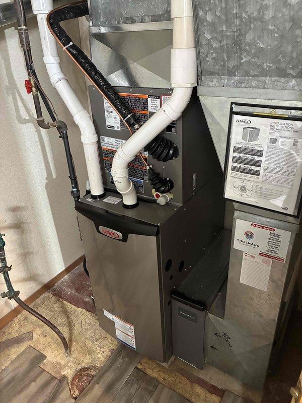 Responded to no cool complaint on recently installed warranty system blowing warm air. Upon arrival, connected refrigerant manifold gauges to measure system pressures and temperatures. Diagnostics revealed abnormal refrigerant charge levels with low-side pressure reading 52.3 and high-side pressure reading 136.7, indicating insufficient refrigerant in the system. Performed systematic leak check and pressure testing to identify source of refrigerant loss. System showed signs of installation-related issue affecting cooling capacity. Corrected refrigerant charge to manufacturer specifications, verified proper airflow through return grille, and confirmed furnace and ductwork connections were secure. System restored to proper cooling operation with pressures and temperatures within normal range.