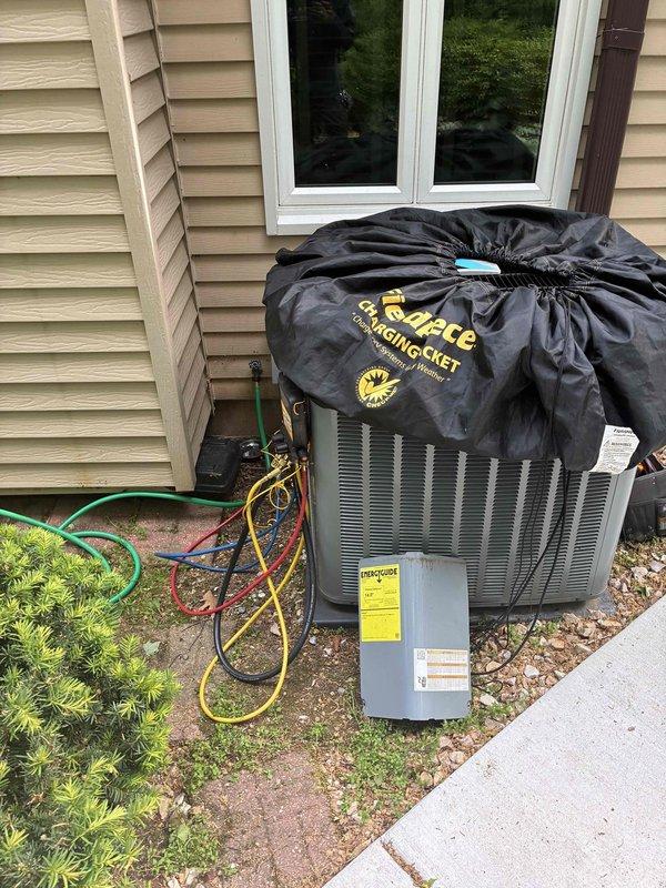 Completed comprehensive AC tune-up service on residential split system. Performed standard maintenance procedures including refrigerant charge verification using manifold gauges, condenser coil inspection, and return air grille assessment. System operational and running within manufacturer specifications upon service completion.