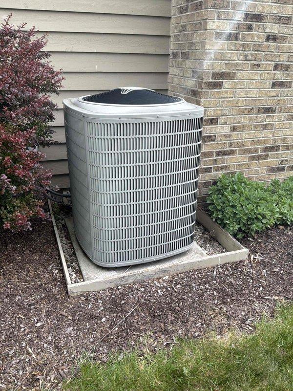 Conducted comprehensive on-site assessment for complete HVAC system replacement, evaluating existing outdoor air conditioning condenser unit and natural gas furnace system. Documented current equipment configuration including exterior condenser unit positioned on concrete pad with proper drainage and existing electrical service panel with circuit breaker distribution system. Provided detailed replacement estimate for new air conditioning system and natural gas furnace to be installed in basement location.
