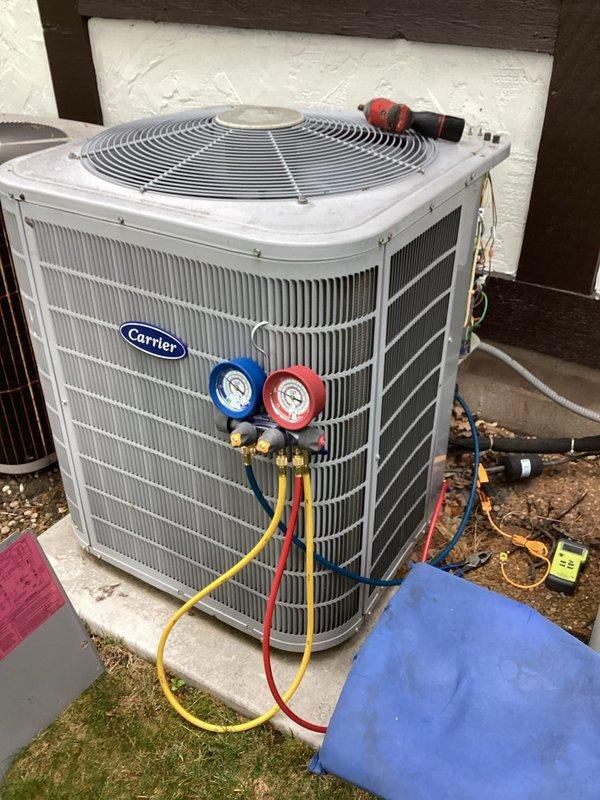 Completed scheduled cooling system maintenance visit as part of family membership plan. Performed comprehensive A/C tune-up including inspection of indoor furnace unit and outdoor Carrier condenser, checked refrigerant pressures using manifold gauges, inspected ductwork and refrigerant lines for proper condition, and verified system operation for optimal performance.