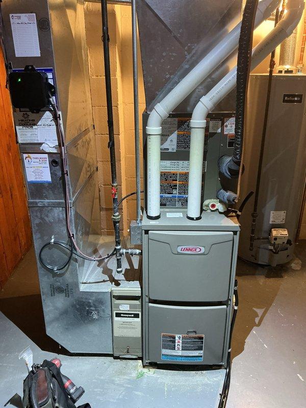 Completed scheduled cooling system maintenance visit as part of membership agreement. Performed comprehensive inspection and service of Lennox HVAC system including indoor furnace/air handler unit in basement mechanical room and outdoor condensing unit. All equipment found operating within normal parameters with proper airflow, refrigerant levels, and electrical connections verified.
