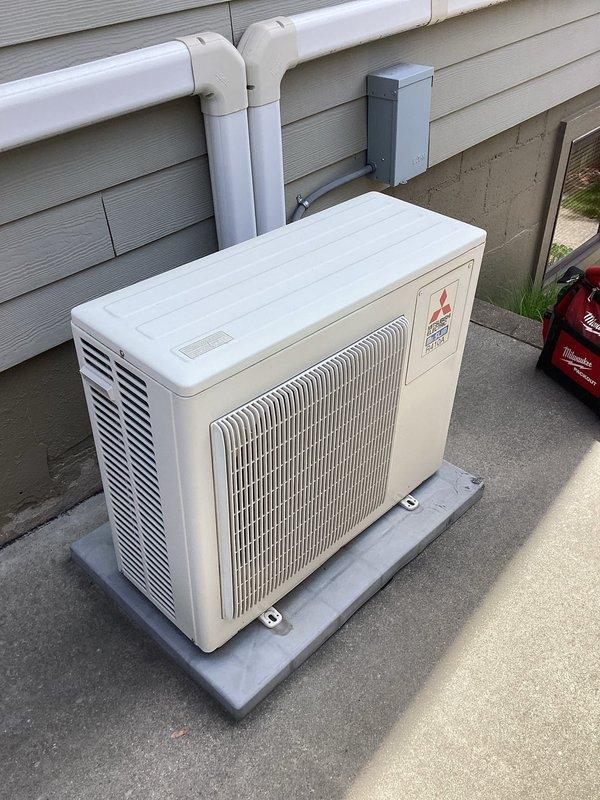 Completed preventive maintenance tune-up on dual-head Mitsubishi ductless mini-split system. Inspected and serviced both indoor wall-mounted air handlers and outdoor condensing unit, checked refrigerant levels, cleaned filters, and verified proper system operation. Assessed blower wheels for cleaning requirements and documented equipment condition with photographs for customer review.