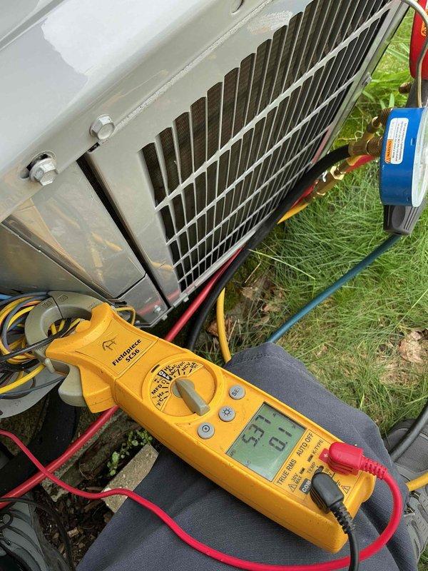 Completed routine cooling system maintenance and inspection as part of prepaid membership service. Performed comprehensive AC tuneup including temperature differential measurements showing 57.8°F readings, inspected TITAN PRO dual capacitor (TRCFD355, 35+5 MFD, 440/370VAC) which displayed surface discoloration but remained operational within specifications, and verified proper operation of outdoor condensing unit with all electrical connections secure and refrigerant lines properly attached.