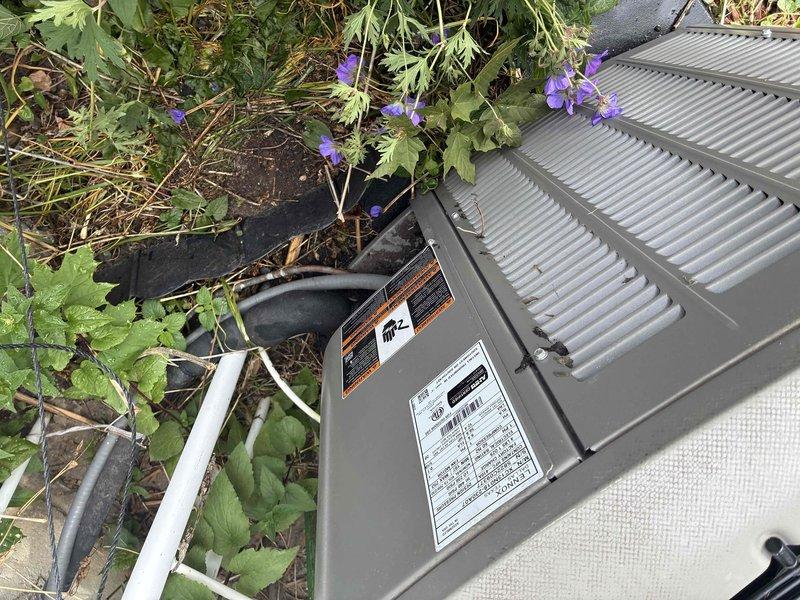 Responded to service call for refrigerant leak detection and repair on Lennox outdoor condensing unit. Performed thorough visual inspection of unit exterior, refrigerant lines, and connection points. Located and repaired refrigerant leak, restored system to proper operating condition.