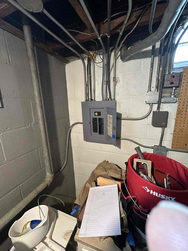 Conducted on-site estimate for mini split installation in home currently served by boiler heating system. Assessed electrical panel capacity and available space in basement utility area to determine feasibility of adding ductless mini split system. Documented existing electrical infrastructure including main panel configuration, available breaker positions, and conduit routing for future installation planning.