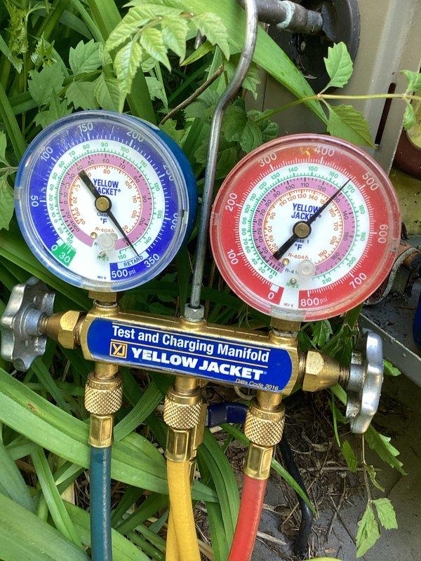 Responded to no cooling complaint on heat pump system. Upon arrival, connected manifold gauge set to verify system pressures and diagnose operational issue. Inspected control wiring at equipment, noting multiple low-voltage thermostat wires present in control panel. Performed diagnostic testing to identify cause of system failure and determine necessary repairs to restore cooling operation.
