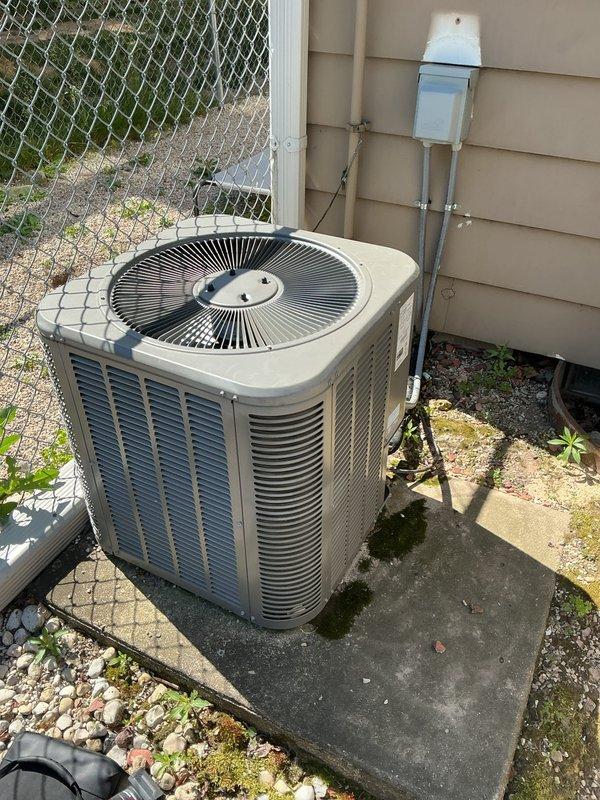 Completed membership activation tune-up for new customer on residential heat pump system. Unit exterior and coil fins were found heavily soiled with dirt, debris, and organic matter accumulation, which was affecting airflow and system efficiency. Performed standard maintenance procedures including equipment inspection, documentation of serial numbers and specifications, and captured condition photos for service records.