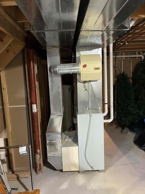 Provided estimate for replacement of 25-year-old original HVAC system including natural gas furnace located in basement and outdoor air conditioning condenser unit. Customer requested separate pricing options for complete system replacement and AC unit only, with financing information included in proposal.