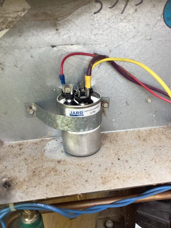 Responded to no cooling complaint on R22 system. Upon inspection, diagnosed failed run capacitor preventing compressor operation. Replaced defective capacitor with proper replacement unit, verified system pressures using manifold gauge set, and confirmed unit returned to normal cooling operation.