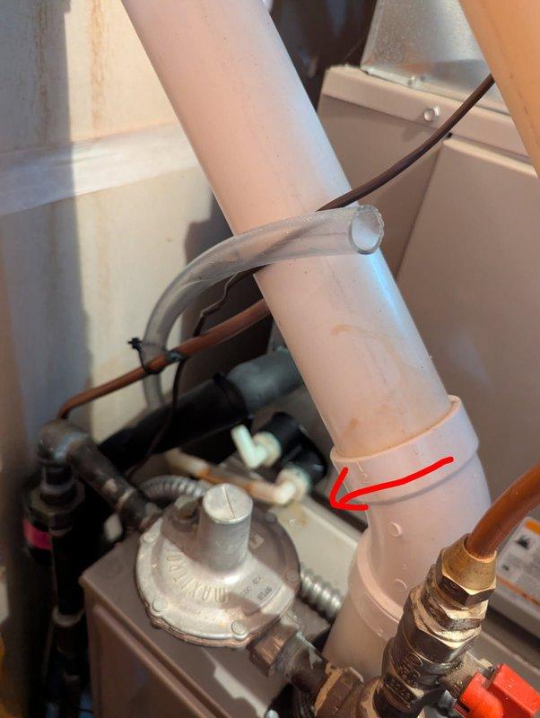 Completed comprehensive tune-up on furnace and air conditioning system. During inspection, discovered minor water accumulation on furnace unit and documented issue with photographs for customer records. Performed standard maintenance procedures including refrigerant pressure testing using manifold gauges on outdoor condensing unit, verified all mechanical connections and gas valve components, and inspected PVC condensate drain line and mounting hardware. All systems operational following service.