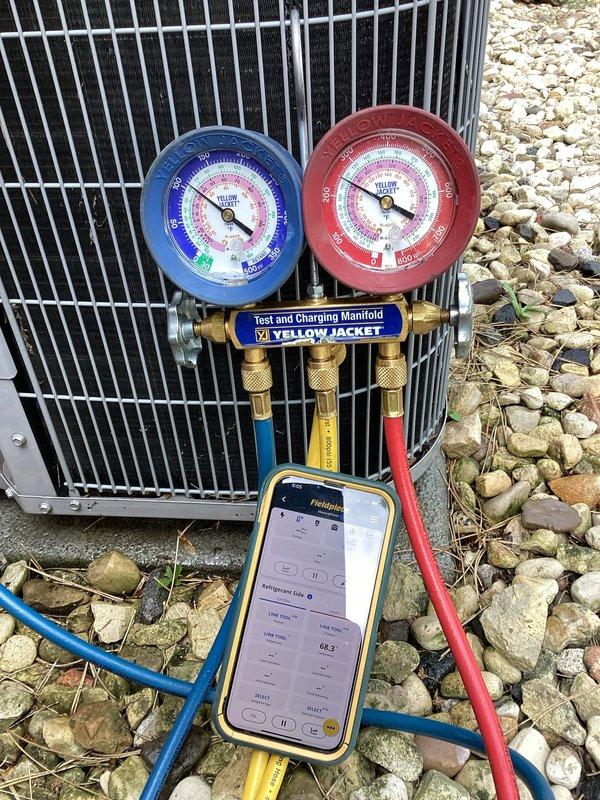 Completed comprehensive tune-up on furnace and air conditioning system. During inspection, discovered minor water accumulation on furnace unit and documented issue with photographs for customer records. Performed standard maintenance procedures including refrigerant pressure testing using manifold gauges on outdoor condensing unit, verified all mechanical connections and gas valve components, and inspected PVC condensate drain line and mounting hardware. All systems operational following service.
