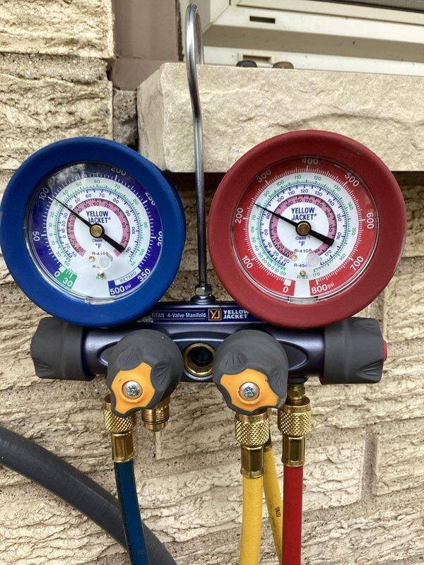Performed comprehensive air conditioning tune-up and preventative maintenance on residential HVAC system. Utilized manifold gauge set to check refrigerant pressures and verify proper system operation, replaced 16x25x5 Healthy Climate filter, and inspected all major components including furnace, air handler, and refrigerant lines. System found to be operating within normal parameters with no issues identified during this recurring maintenance visit.