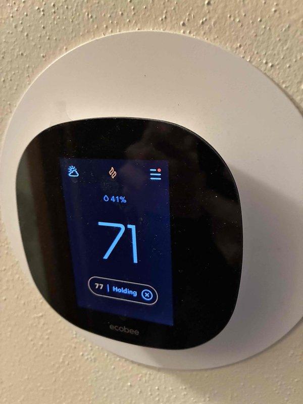 Completed comprehensive furnace and air conditioning tune-up service at residential property. Replaced HVAC system air filters with new pleated filters and verified proper thermostat operation, confirming ecobee smart thermostat displaying accurate temperature readings and humidity levels at 41%.