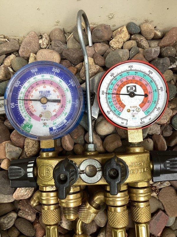 Completed complimentary air conditioning tune-up service using seasonal promotional coupon. Performed standard maintenance procedures on residential HVAC system, including refrigerant pressure testing and system diagnostics using manifold gauge set. All equipment operating within normal parameters upon completion of service.