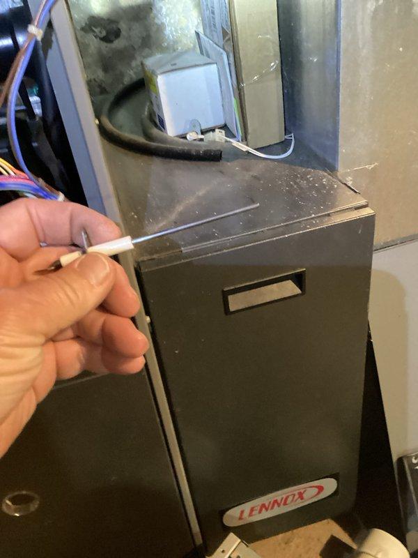 Completed furnace tune-up and air conditioning tune-up on Lennox HVAC system. Performed comprehensive maintenance including system inspection, replaced humidifier pad, verified all electrical connections and refrigerant levels on outdoor condenser unit. All components tested and operating within normal parameters.