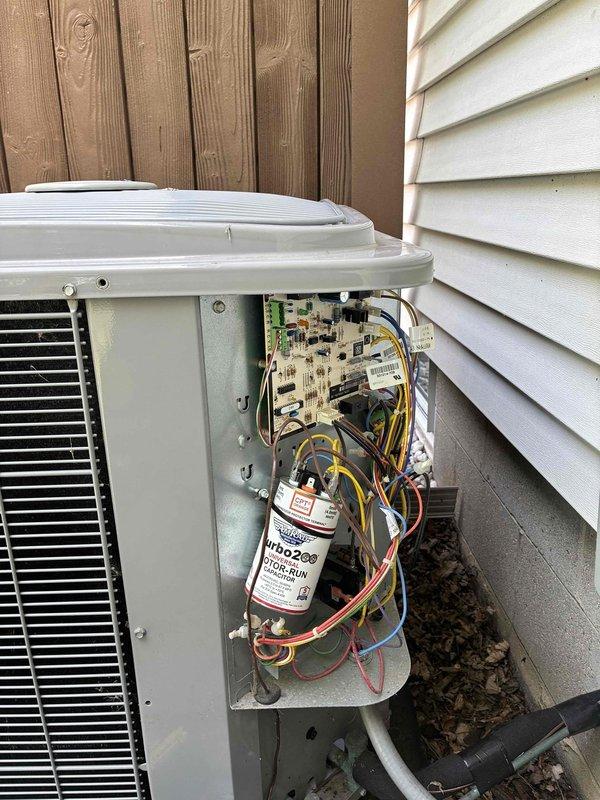 Completed comprehensive furnace tune-up including full system diagnostics and performance verification. Utilized SC680 multimeter to test electrical components, measure voltage levels, and verify capacitor functionality on the outdoor condensing unit. Inspected and assessed all internal electrical connections, circuit board operation, and compressor components with access panel removed for thorough evaluation. All systems tested within normal operating parameters and unit returned to service.