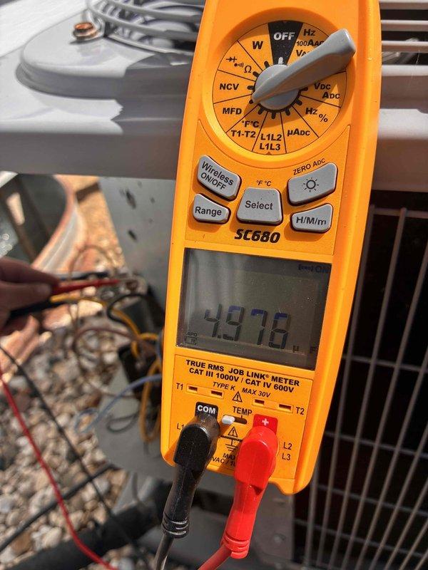 # HVAC Tune-Up Service Completed

Performed comprehensive tune-up on HVAC system with diagnostic testing using digital multimeter to verify electrical parameters and temperature differentials across refrigerant lines. All measurements confirmed system operating within manufacturer specifications, with proper voltage readings and temperature splits indicating optimal performance and efficiency.