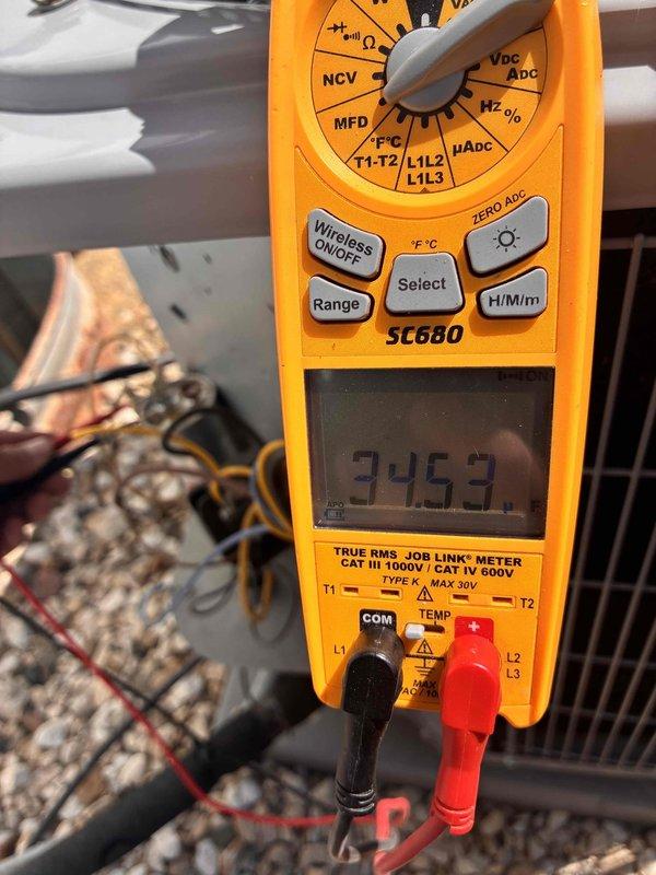 # HVAC Tune-Up Service Completed

Performed comprehensive tune-up on HVAC system with diagnostic testing using digital multimeter to verify electrical parameters and temperature differentials across refrigerant lines. All measurements confirmed system operating within manufacturer specifications, with proper voltage readings and temperature splits indicating optimal performance and efficiency.