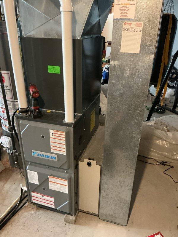 Completed annual tune-up maintenance on Daikin split system including indoor furnace unit and outdoor condensing unit. Performed comprehensive system inspection, verified proper operation of all components, checked refrigerant levels, cleaned condenser coils, inspected electrical connections, tested safety controls, and confirmed optimal airflow throughout the system.