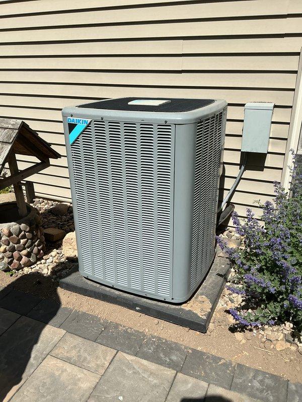 Completed annual tune-up maintenance on Daikin split system including indoor furnace unit and outdoor condensing unit. Performed comprehensive system inspection, verified proper operation of all components, checked refrigerant levels, cleaned condenser coils, inspected electrical connections, tested safety controls, and confirmed optimal airflow throughout the system.