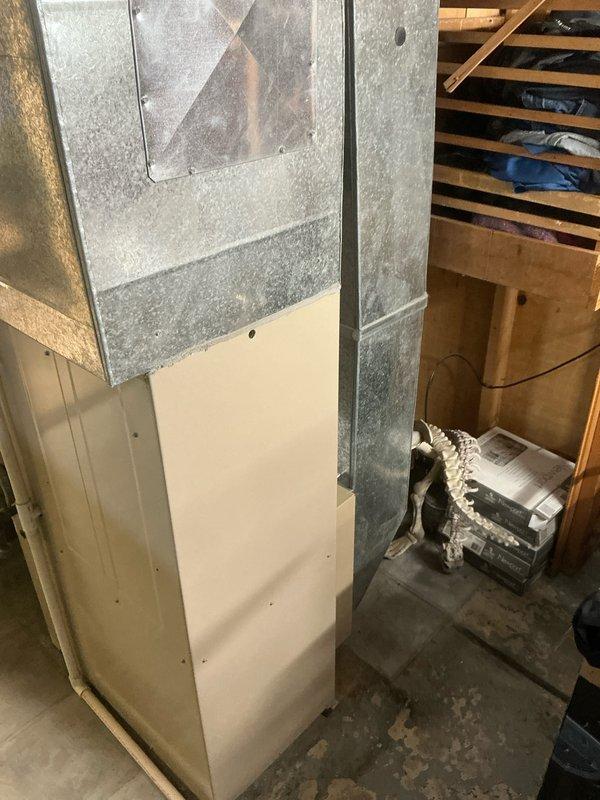 Responded to lead for non-functioning air conditioning system and provided comprehensive estimate for complete HVAC replacement including both furnace and AC unit. Assessed existing natural gas furnace installation in basement with associated ductwork, venting through white PVC pipes, and copper gas lines with shutoff valves. Evaluated current system configuration, measured equipment specifications, and documented existing setup with photographs to prepare accurate replacement proposal for new heating and cooling equipment.