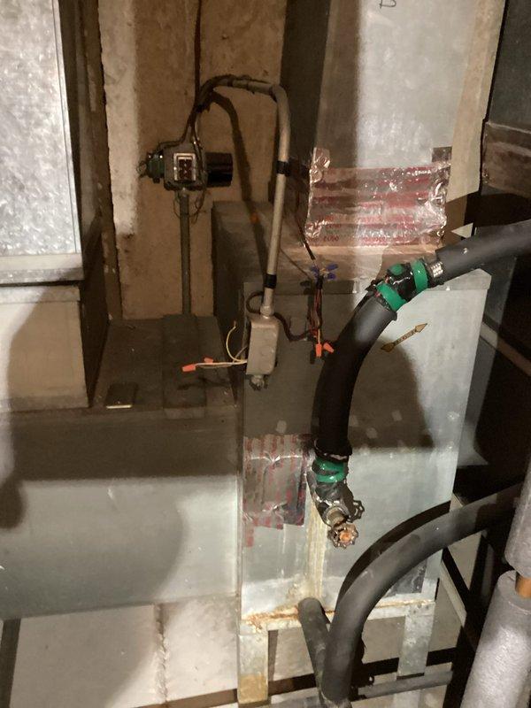 Responded to no cooling call on residential HVAC system over 10 years old. Upon arrival, performed diagnostic inspection of furnace and air conditioning components in basement mechanical room. Assessed electrical connections, refrigerant lines, condensate drainage system, and control wiring throughout the installation. System evaluation completed during specified afternoon service window, with photographic documentation taken of equipment condition and mechanical room layout for service records.