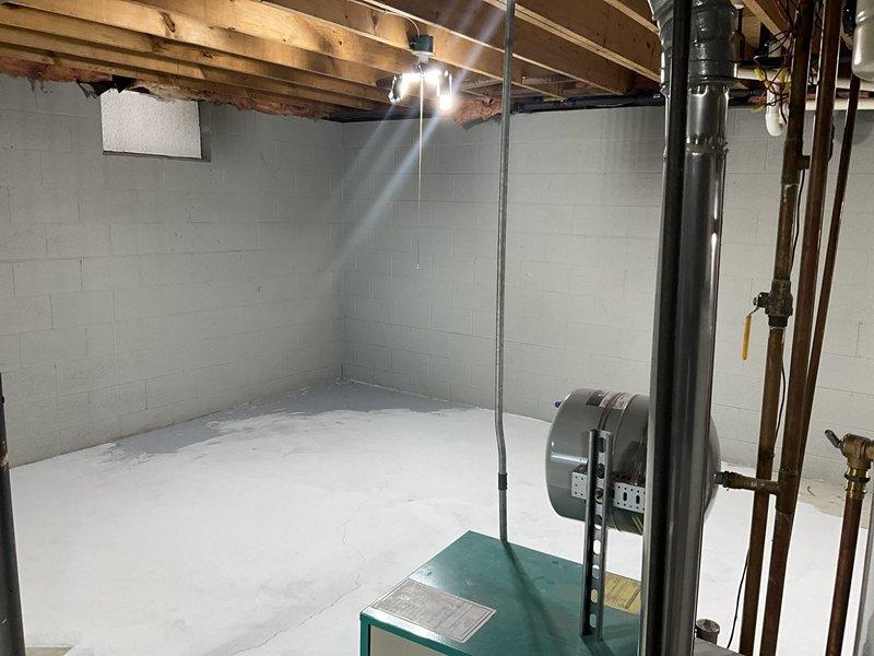 Provided estimate for complete HVAC system conversion from existing boiler heating system to forced air furnace and air conditioning in unfinished basement. Assessed current mechanical room layout, existing ductwork requirements, and equipment placement options for new forced air system installation. Also evaluated dryer vent routing feasibility for proposed laundry relocation to upper level.