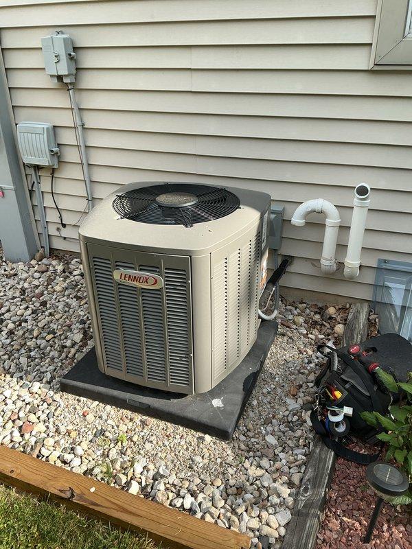 Completed annual tune-up on Lennox outdoor condensing unit. Unit exterior and coil surfaces showed heavy dirt and debris accumulation, which were cleaned during service. Verified operation of all components, checked refrigerant levels, and inspected electrical connections and service valves.