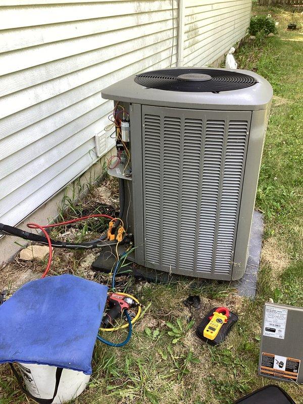 Completed comprehensive air conditioning tune-up service on residential split system. Performed diagnostic testing on outdoor condensing unit, checked refrigerant levels and electrical connections, and inspected indoor furnace/air handler components. Customer was reminded to provide 16x25x5 air filter for system maintenance.