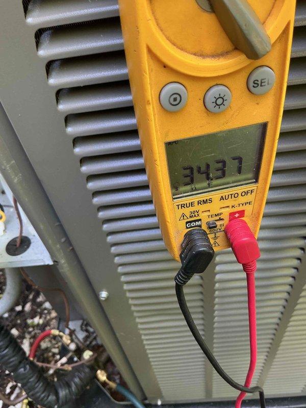 Completed scheduled membership cooling system maintenance visit with 11 AM arrival as requested. Performed comprehensive diagnostics on residential central air conditioning system, including electrical measurements using digital multimeter which indicated 343.1 volts at the outdoor condensing unit. Conducted thorough inspection of outdoor unit positioned in landscaped area with proper clearance, verified all mechanical components, heat exchanger coils, and refrigerant lines were functioning within normal parameters.