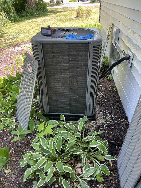 Completed scheduled membership cooling system maintenance visit with 11 AM arrival as requested. Performed comprehensive diagnostics on residential central air conditioning system, including electrical measurements using digital multimeter which indicated 343.1 volts at the outdoor condensing unit. Conducted thorough inspection of outdoor unit positioned in landscaped area with proper clearance, verified all mechanical components, heat exchanger coils, and refrigerant lines were functioning within normal parameters.