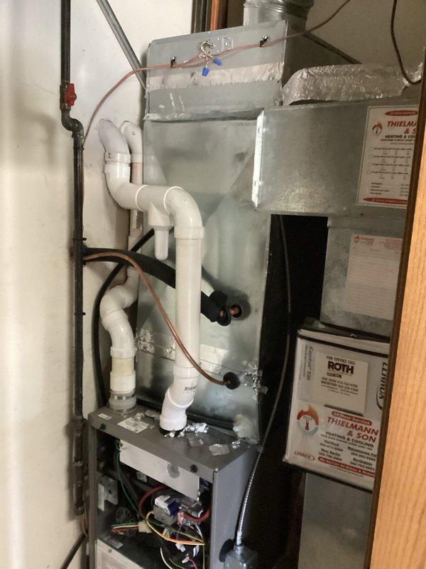 Responded to service call for air conditioning system not cooling to desired temperature with previous coil freezing issue. Upon arrival, customer confirmed evaporator coil had thawed out since last occurrence. Performed system inspection of both indoor air handler unit and outdoor condensing unit. Evaluated airflow, refrigerant lines, and overall system operation to diagnose cause of inadequate cooling and previous freeze-up condition. Documented equipment condition with photos for service records.