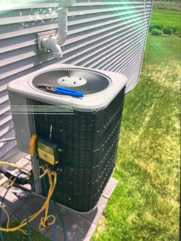 Completed prepaid cooling system maintenance visit on residential AC unit. Performed standard system diagnostics using Fieldpiece SMAN refrigerant manifold and micron gauge to verify refrigerant pressures and system performance. All measured values were within normal operating parameters. Inspected outdoor condenser unit, confirmed proper operation of fan assembly, and verified electrical connections were secure. System operating efficiently with no issues identified.