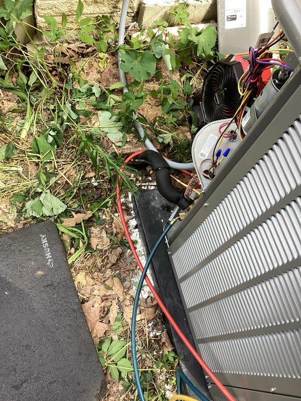Completed installation of new outdoor air conditioning condenser unit and evaporator coil system. Unit was properly positioned on equipment pad, electrical connections were made with appropriate gauge wiring and color coding, refrigerant lines were installed and secured, and all components were tested for proper operation. System is operational and ready for use.