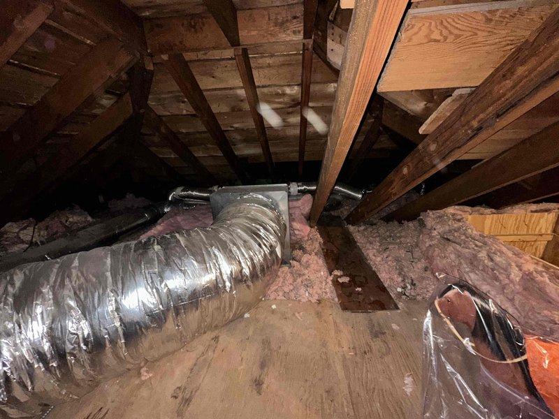 Responded to emergency service call for Unico system located in attic space. Arrived within scheduled window, conducted thorough inspection of existing ductwork and HVAC components, documented current system configuration with photos showing metallic flexible ductwork, exposed wooden framing, and insulation conditions to provide comprehensive estimate for complete system replacement.