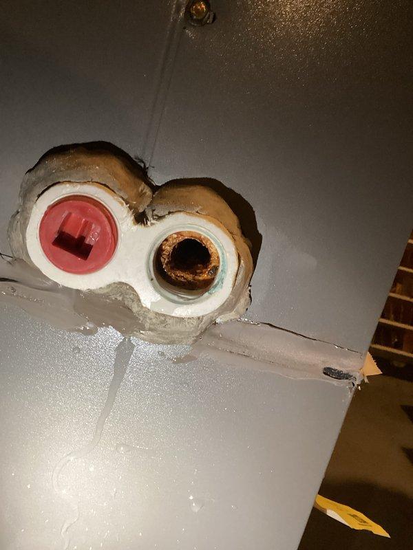 Responded to call for water accumulation beneath furnace during AC operation. Upon inspection, discovered clogged condensate drain line causing water to overflow and pool on floor. Cleared blockage from drain line, verified proper drainage flow, and cleaned drain pan. Inspected drain trap and confirmed proper operation of condensate removal system.