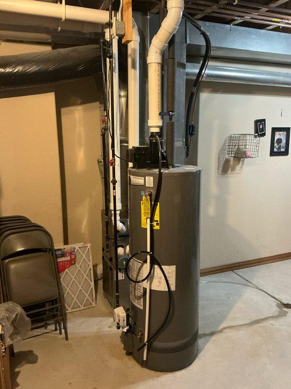 Provided estimate for residential water heater replacement in basement utility area. Customer requested expedited same-day installation with advance notice upon technician arrival to coordinate departure from work.
