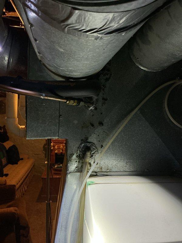 Completed comprehensive air conditioning tune-up service on residential split system. Performed full system inspection of outdoor condenser unit and indoor air handler components, including cleaning of coils, verification of refrigerant levels, electrical connections testing, and airflow measurements. All components found operating within manufacturer specifications with no deficiencies noted.