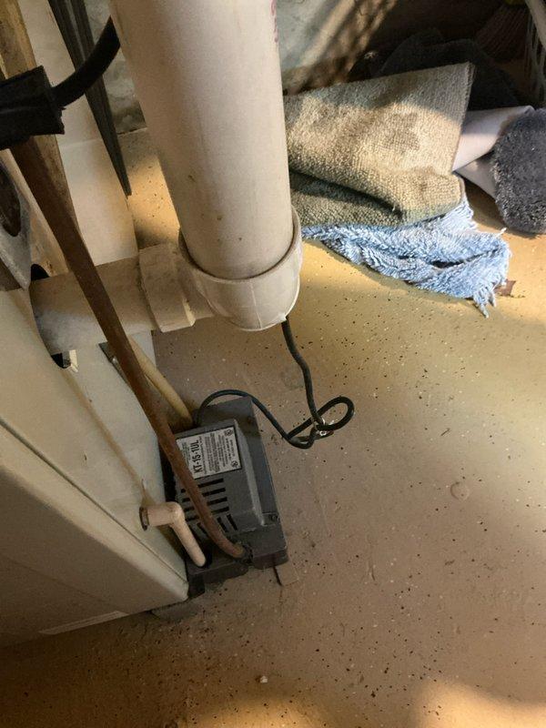 Responded to emergency service call for furnace and air conditioning system evaluation and replacement estimate. Conducted comprehensive assessment of existing HVAC equipment, documented electrical panel configuration showing dedicated AC circuit breaker, and photographed condensate pump installation with PVC drainage system in mechanical area. Provided detailed replacement options and specifications for new heating and cooling equipment suitable for the property.