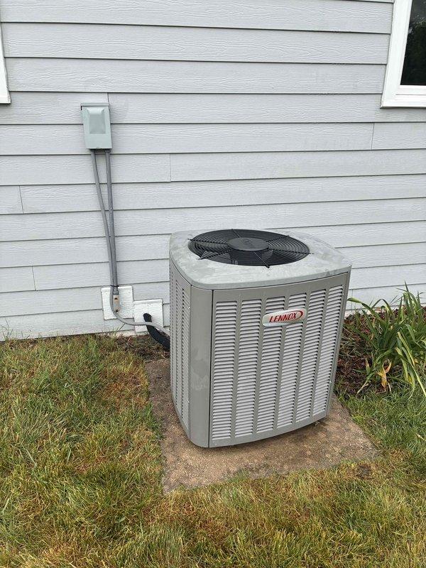 Completed annual cooling system maintenance on Lennox air conditioning unit as part of prepaid membership visit. Performed comprehensive tune-up including system inspection, refrigerant level check, electrical connections verification, and condenser coil cleaning. Addressed customer concern regarding whistling noise originating from furnace; inspected blower assembly and identified minor airflow restriction. Evaluated condensate drain lines per customer request and confirmed black discoloration present, indicating mold growth and deterioration. Recommended drain line replacement to prevent future clogs and ensure proper condensation removal. Verified outdoor unit operation, confirmed adequate airflow through condenser, and tested system cycling. Unit operating within manufacturer specifications at time of service completion.