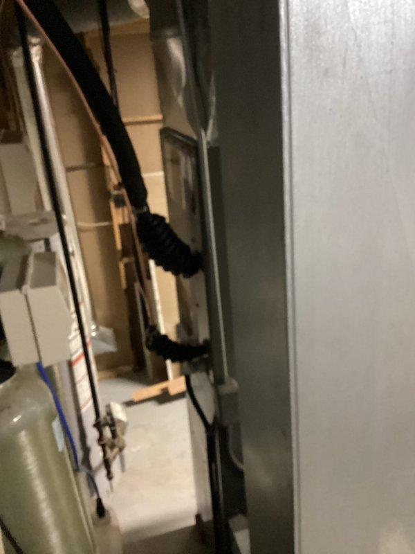 Completed installation of new air conditioning system and evaporator coil unit in basement mechanical room. System was financed and includes new refrigerant lines with proper insulation, condensate drainage, and all necessary electrical connections to existing ductwork. Post-installation testing confirmed proper operation and refrigerant charge levels.