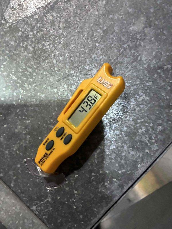 Responded to no cooling complaint on residential HVAC system. Upon arrival, found thermostat set to 71°F but current temperature reading 66°F, indicating system not reaching setpoint. Performed diagnostic evaluation and measured suction line temperature at -1.3°F, confirming severely low refrigerant charge or restriction in system. Outdoor unit coil fins previously cleaned but system still not producing adequate cooling or condensation at evaporator coil, consistent with refrigerant issue requiring further leak detection and repair.
