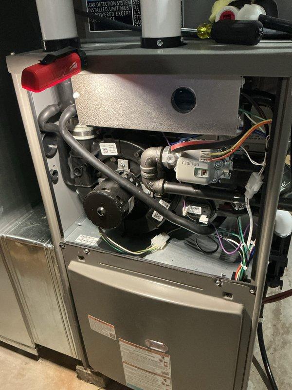 Responded to warranty call for no cooling condition. Upon arrival, found that furnace had been turned off, preventing air conditioning system from operating. Inspected electrical panel and verified power supply to HVAC system. Examined furnace interior components including blower assembly, condensate trap, and control wiring. Confirmed all mechanical and electrical connections were secure and properly installed per manufacturer specifications. Restored power to furnace, verified proper startup sequence, and confirmed air conditioning system activated and operated normally. System tested and left in proper working condition.