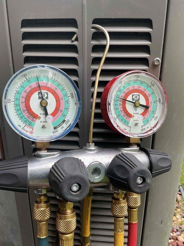 Completed routine cooling season maintenance visit on residential Lennox air conditioning system as part of membership agreement. Performed comprehensive tune-up including refrigerant pressure testing using manifold gauges, inspected outdoor condensing unit operation, verified fan assembly function, and assessed overall system performance. Unit found operating within normal parameters with no immediate service needs identified.